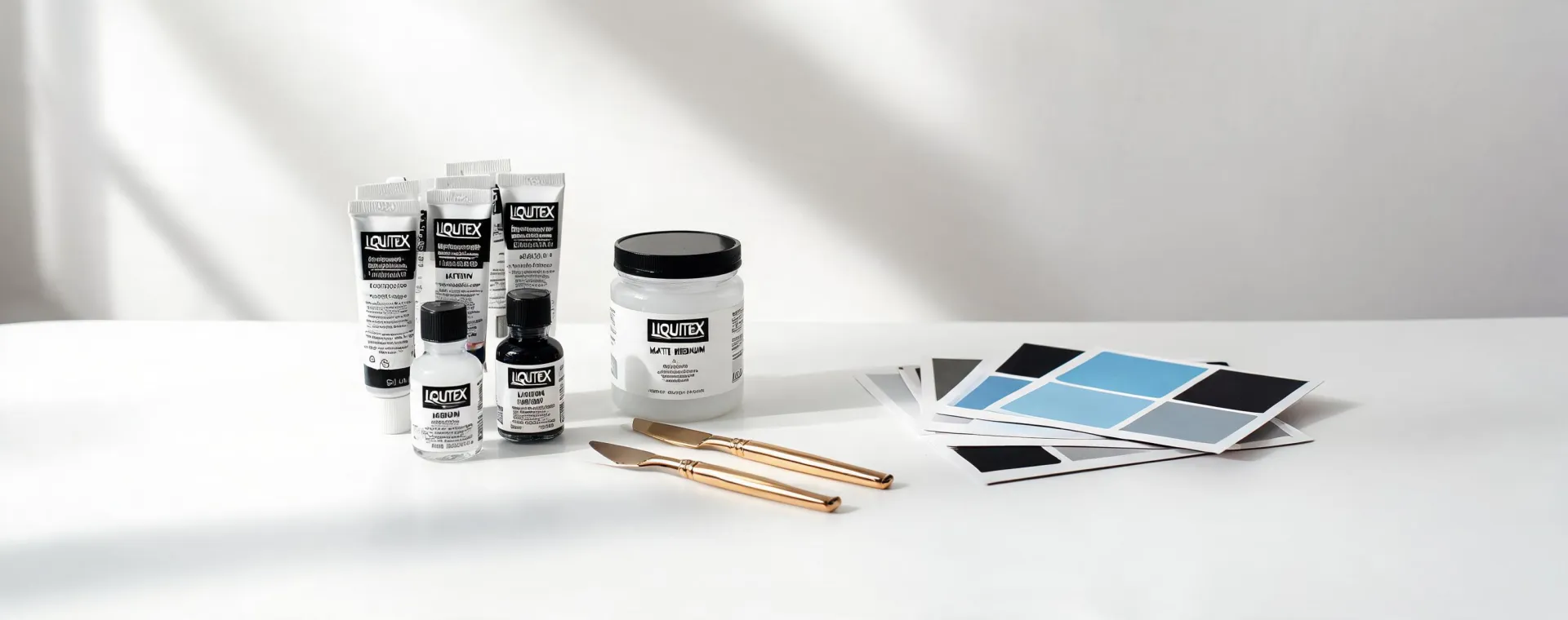 Liquitex acrylic paint and medium sets in a working art studio